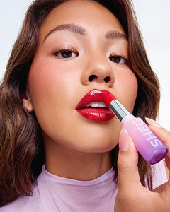Lip makeup collection featuring matte lipsticks, lip glosses, and lip liners