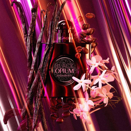 A perfume bottle labeled 'Black Opium' surrounded by vanilla pods, coffee beans, and pink orchid flowers against a dramatic purple and magenta striped background.